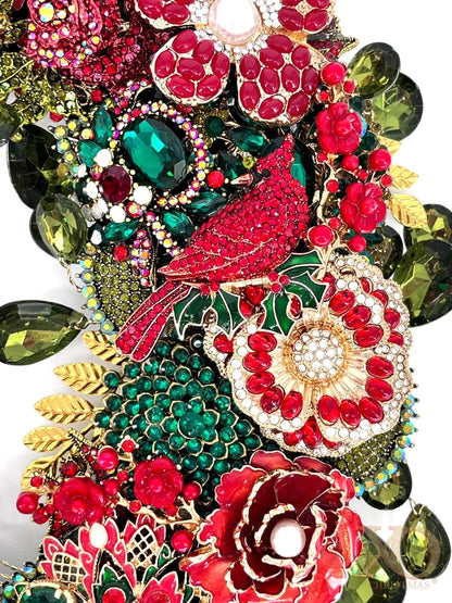 Close-up of Cardinal Rose jeweled Christmas wreath: red jeweled cardinal, emerald rhinestone flowers, red jeweled roses, and sage green teardrop rhinestones
