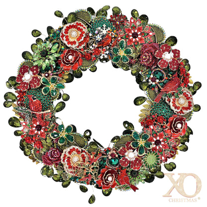Jeweled Christmas wreath with red cardinals, enamel flowers, faux pearls, gold filigree, red and green jeweled flowers, leaf accents, and dangling sage green rhinestone teardrops