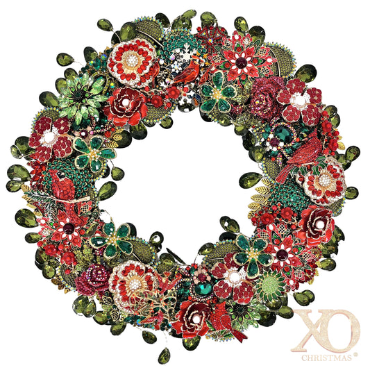 Jeweled Christmas wreath with red cardinals, enamel flowers, faux pearls, gold filigree, red and green jeweled flowers, leaf accents, and dangling sage green rhinestone teardrops