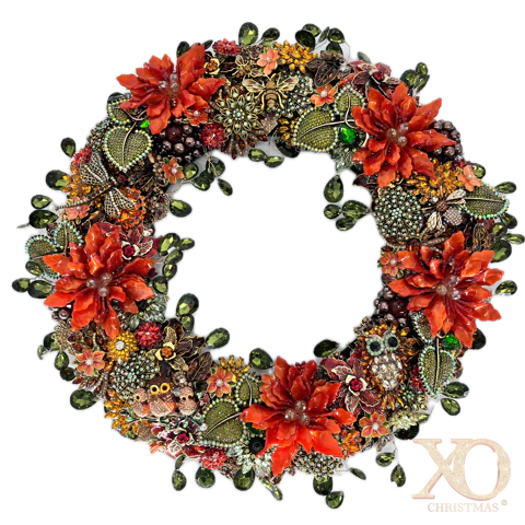 An ornate circular jeweled wreath decorated with large red-orange faux flowers, jeweled green leaves, beads, and small owl and butterfly embellishments, shown on a plain white background.

