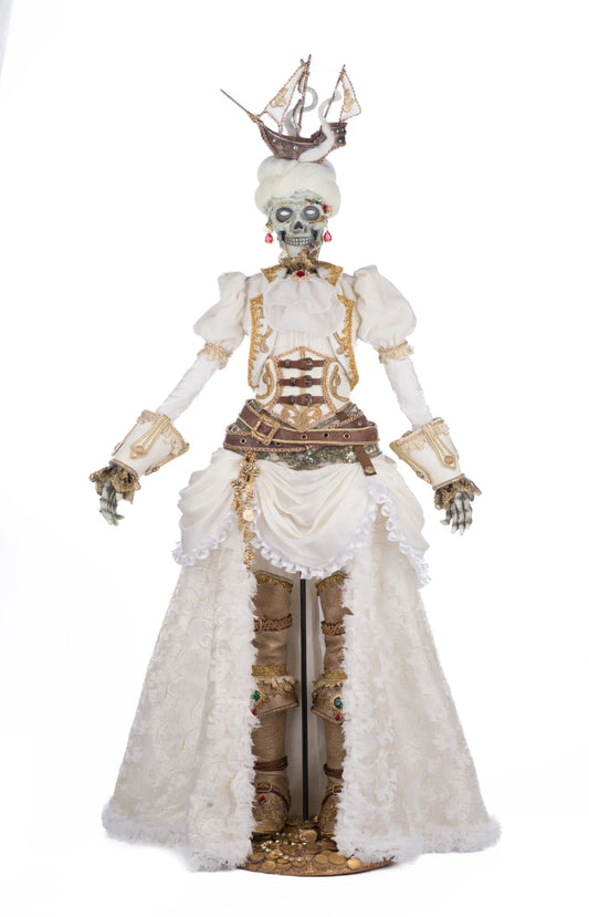Katherine's Collection Lady Adelaid Apparition Doll shown in full front view on her stand, with the lace skirt open to reveal gold-wrapped leg wraps and boots, set atop a base scattered with gold coins.