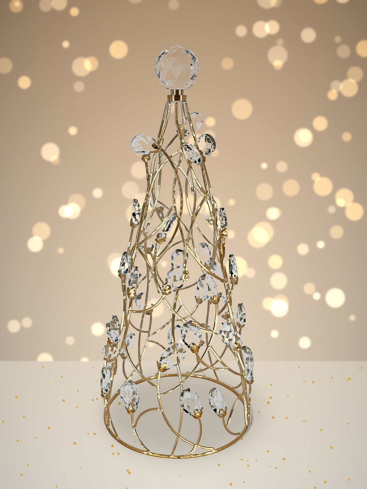 Mark Roberts Crystal Cone Tree, 18.5 inches: a cone-shaped gold wire lattice tree with curved, crisscrossing wires, clear faceted drops with small gold accents, a large clear faceted topper, and a round gold base ring. 