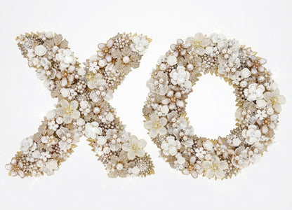 Ivory pearl-style jeweled wall art set — letter X and letter O hand-set with ivory florals, faux pearls, and rhinestones on gold-tone letters