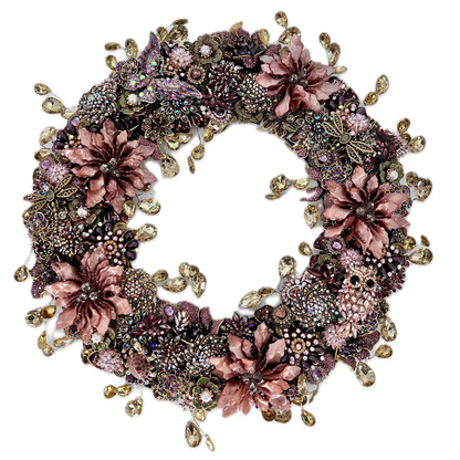 Full view of an ornate circular jeweled wreath densely covered in dusty-rose enamel flowers, purple and pink rhinestone clusters, pearls, gold filigree, butterflies, and other floral motifs, with champagne-colored teardrop rhinestones dangling from both the outer and inner edges.