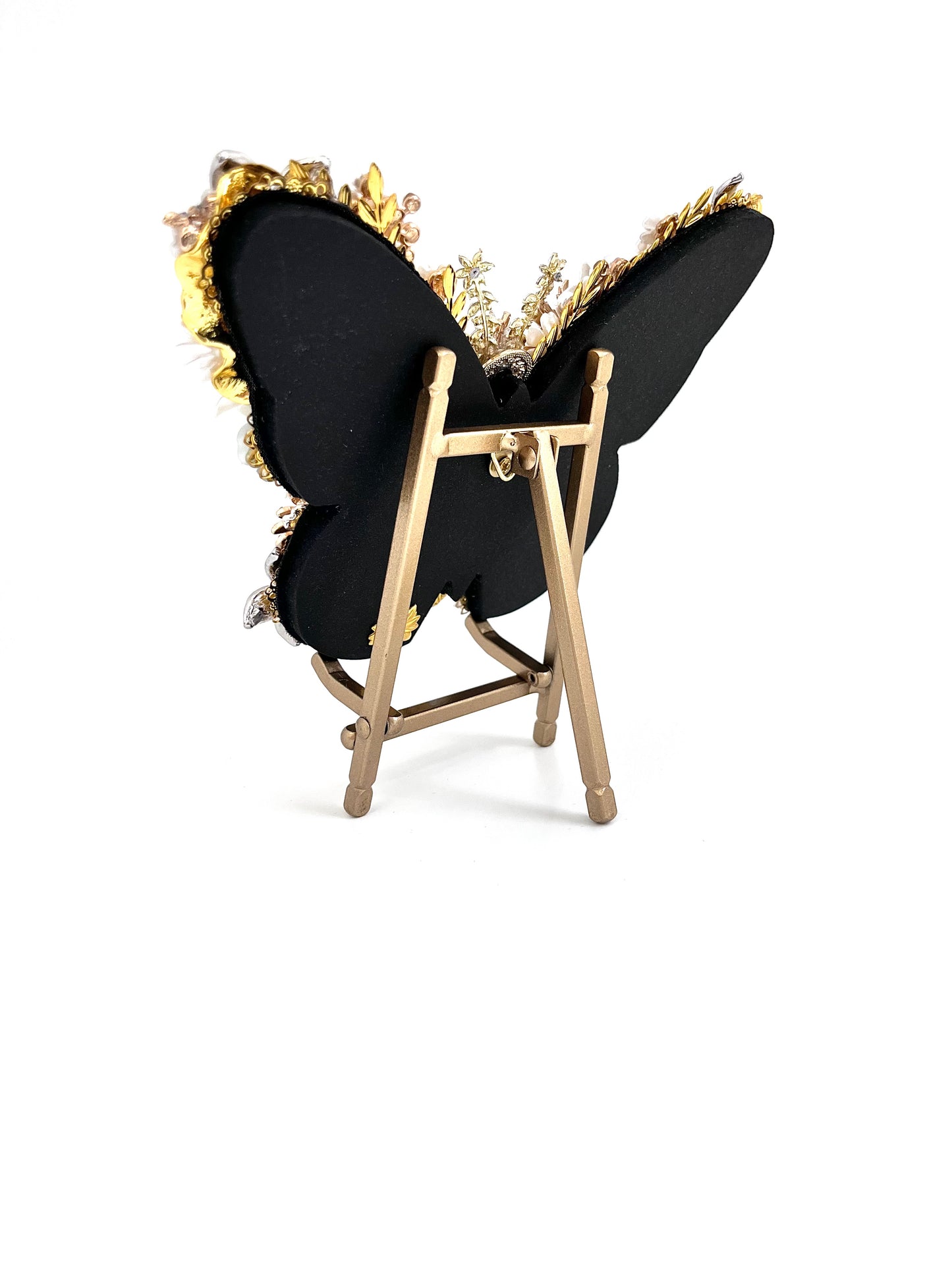 Back view of White Pearl Jeweled Butterfly Sculpture on gold easel, showing sleek black backing with gold jeweled edge detail — handmade in the USA