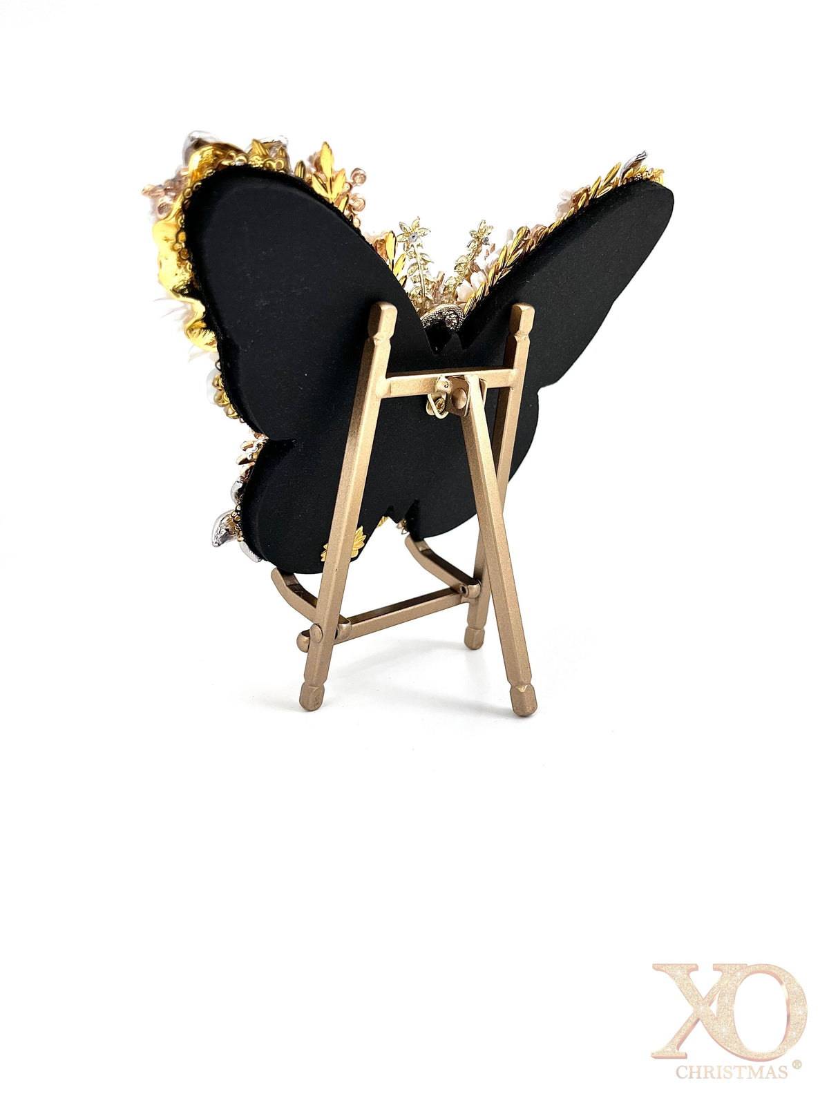Back view of White Pearl Jeweled Butterfly Sculpture on gold easel, showing sleek black backing with gold jeweled edge detail